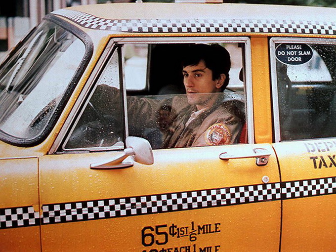 Robert De Niro in Taxi Driver by Martin Scorsese 1976 . yellow taxi