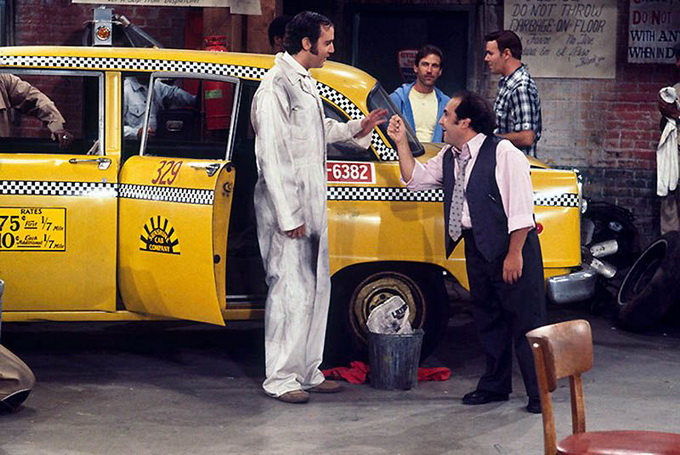 TV comedy Taxi with Andy Kaufman and Danny DeVito. 1978. yellow taxi